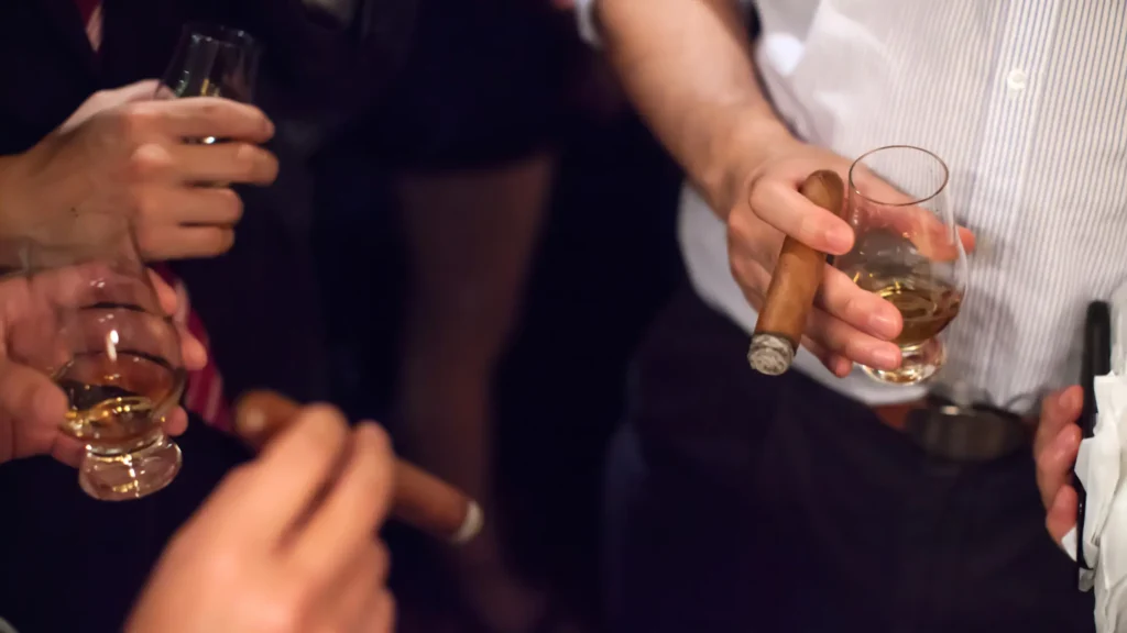 Smoke cigars at a wedding