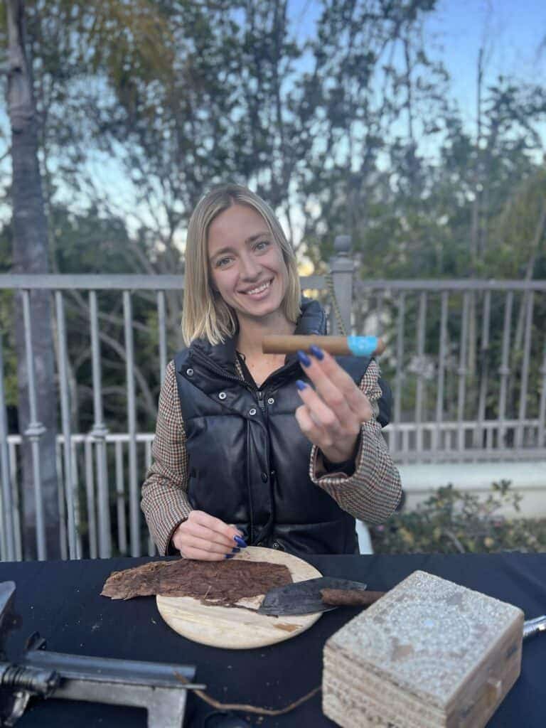 Cigar rolling demonstration in Los Angeles featuring special announcement cigar bands with funny or special messages.