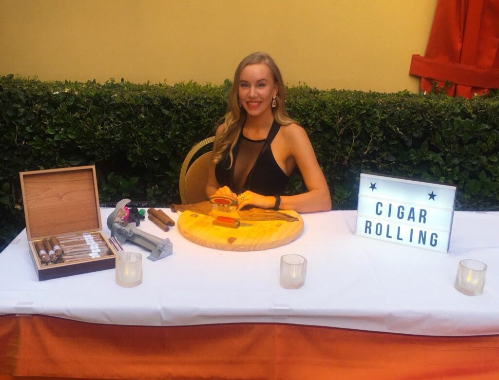 Cigar rolling station at trade event in Dallas, by Cigar Bella.