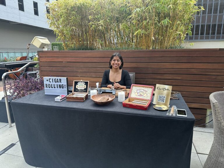 Cigar Bella's Cuban cigar rolling station located at a private event in San Antonio, Texas.